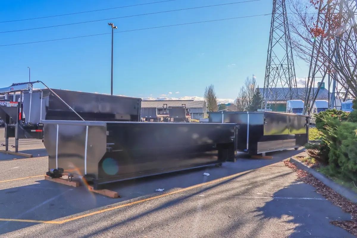 Roll-off dumpster ready for waste disposal at job site for 4 Yard Dumpster Rental in Shirley